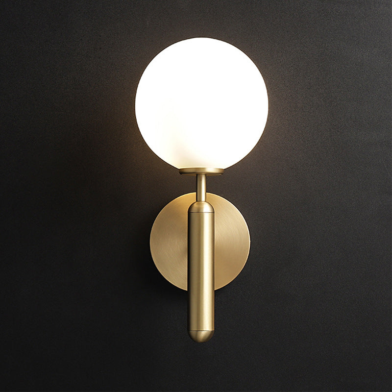 Sleek Brass Wall Light with Glass Shade