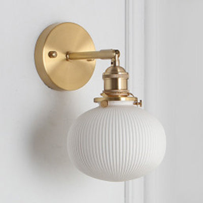 Elegant White Wall Sconce with Brass Accent