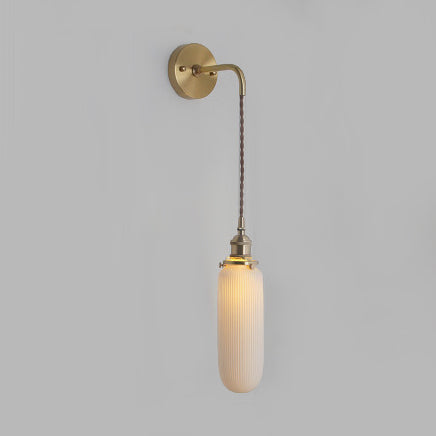 Elegant White Wall Sconce with Brass Accent