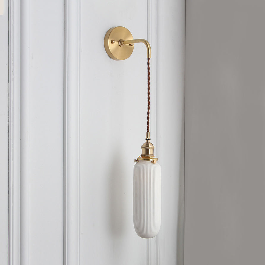 Elegant White Wall Sconce with Brass Accent