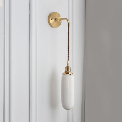 Elegant White Wall Sconce with Brass Accent
