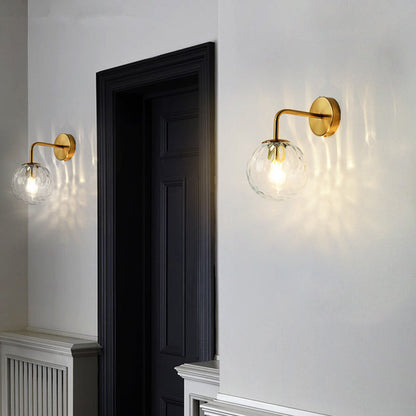 Sleek Round Glass Wall Light with Adjustable Arm