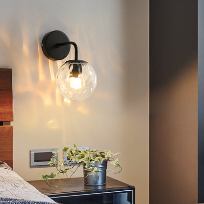 Sleek Round Glass Wall Light with Adjustable Arm