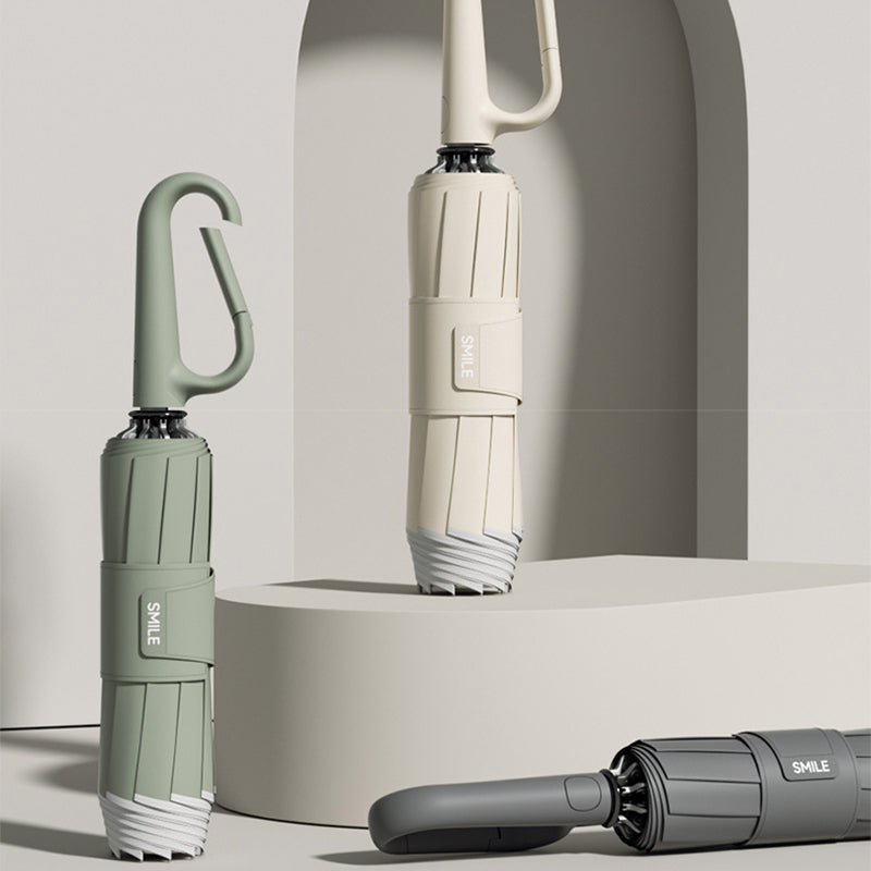 Compact Umbrella with Secure Buckle Closure
