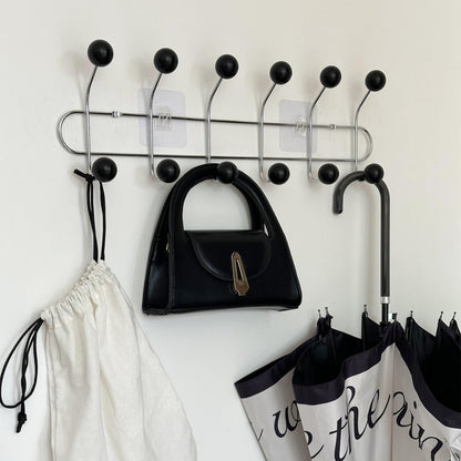 Hidden Iron Coat Hook with Storage
