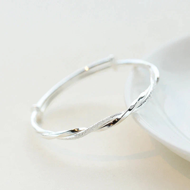 Sleek Sterling Silver Twist Bracelet