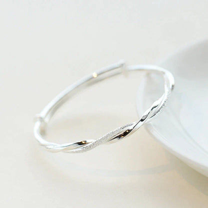 Sleek Sterling Silver Twist Bracelet