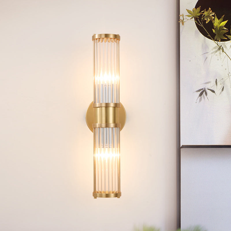 Sleek 2-Light Gold Wall Sconce with Clear Glass Shade