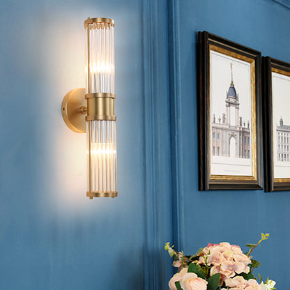Sleek 2-Light Gold Wall Sconce with Clear Glass Shade