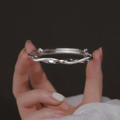 Sleek Sterling Silver Twist Bracelet