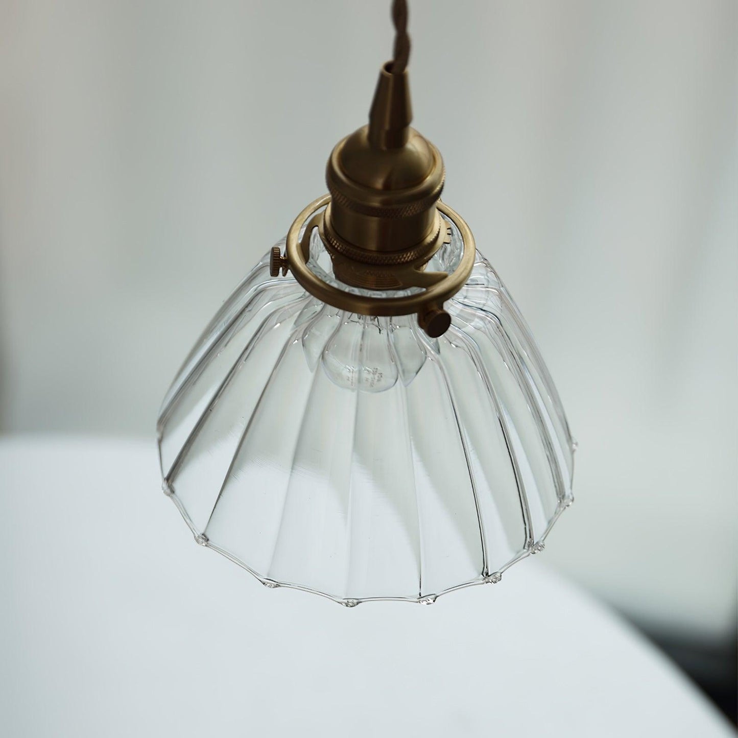 Sleek Brass Pendant Light Clear Glass Shade