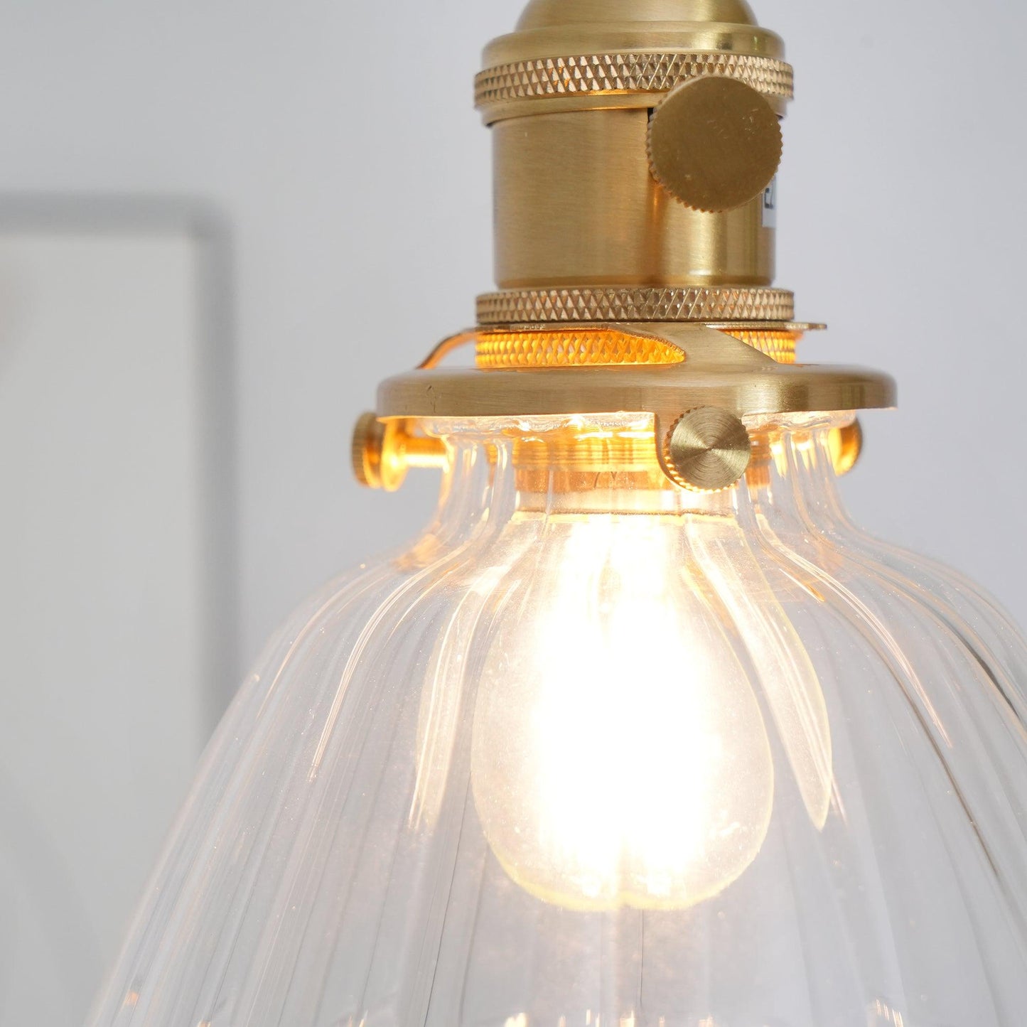 Sleek Brass Pendant Light Clear Glass Shade