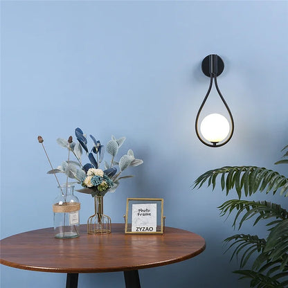 Sleek Metal Glass Globe Wall Light