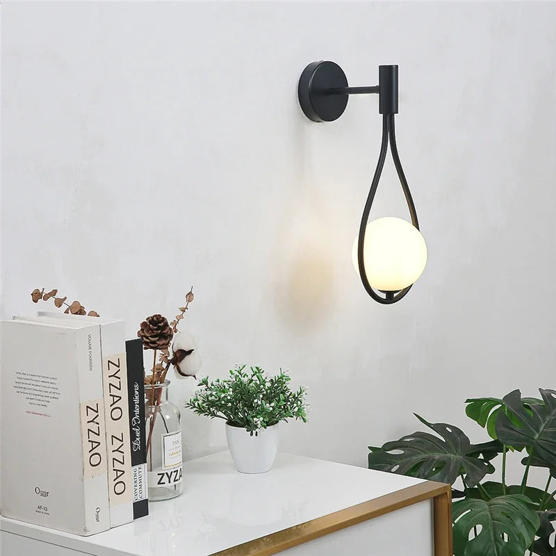 Sleek Metal Glass Globe Wall Light