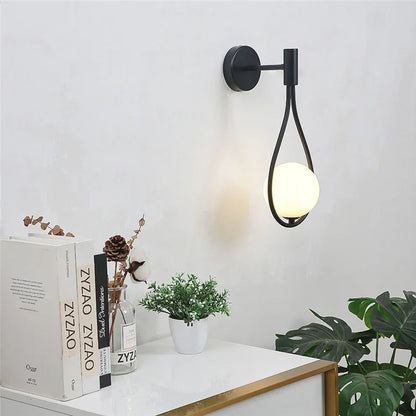 Sleek Metal Glass Globe Wall Light