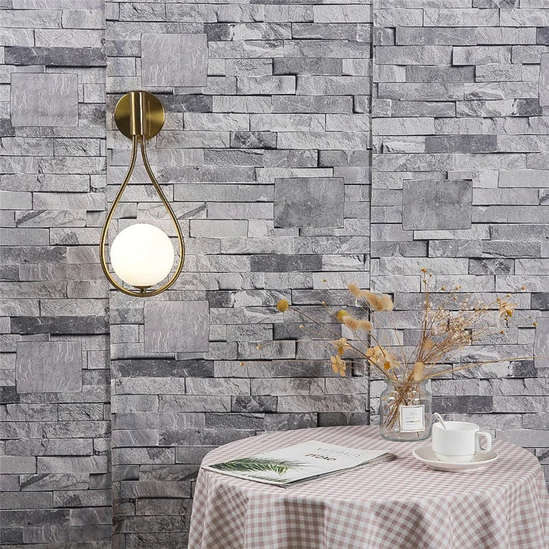 Sleek Metal Glass Globe Wall Light