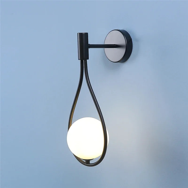 Sleek Metal Glass Globe Wall Light