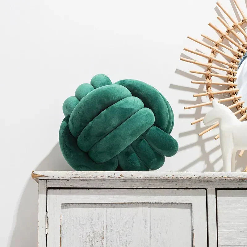 Plush Cushion with Knotted Suede Ball Accent