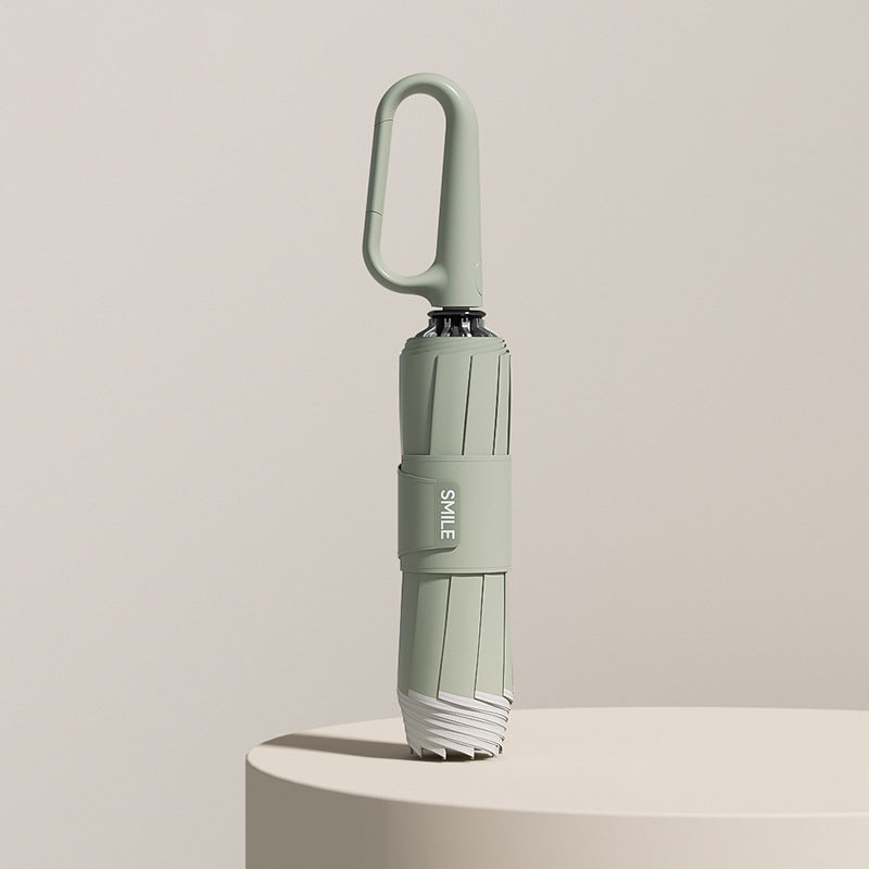 Compact Umbrella with Secure Buckle Closure