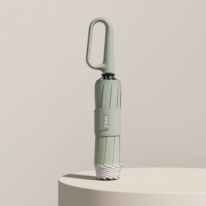 Compact Umbrella with Secure Buckle Closure