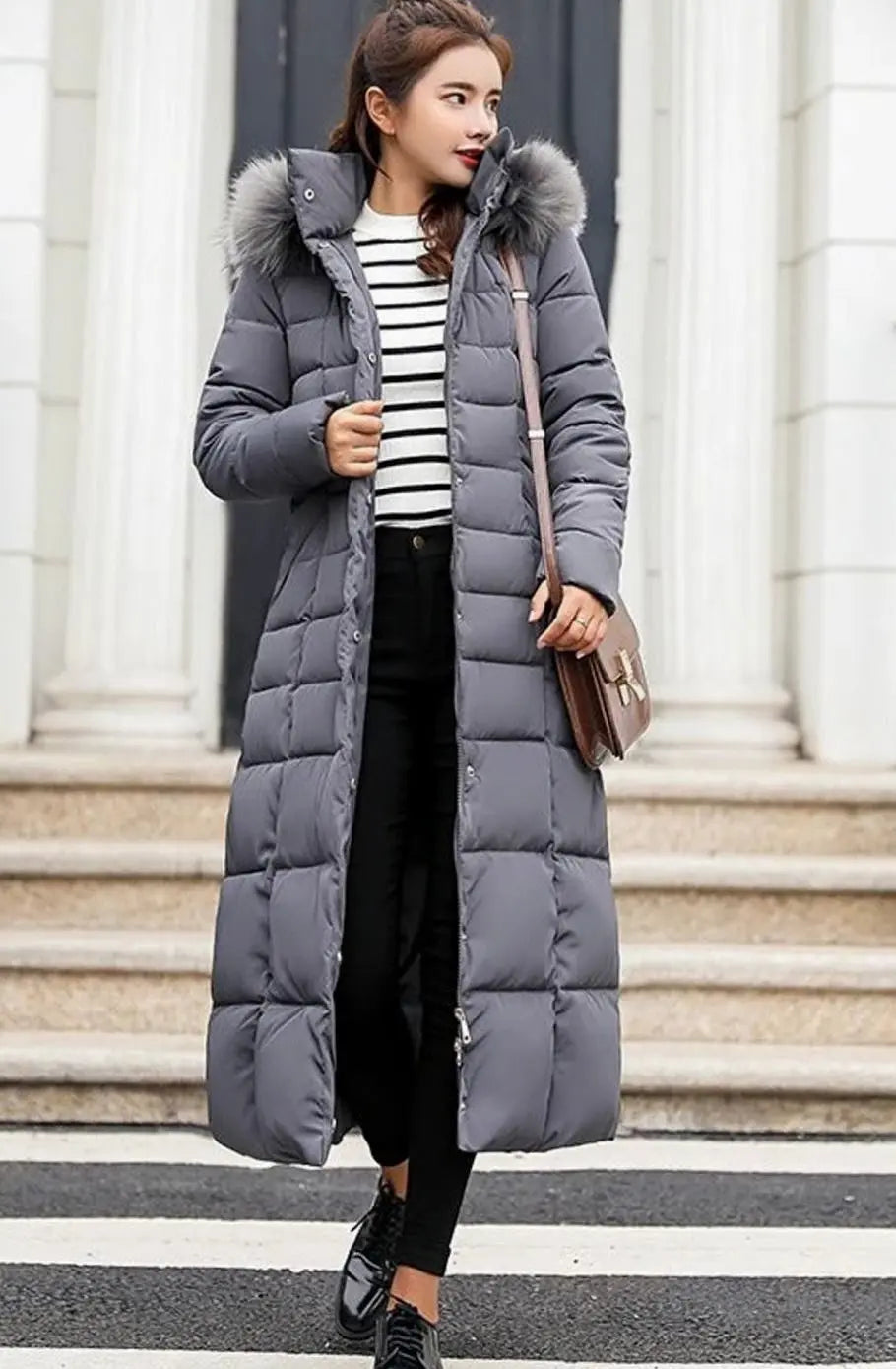 Women's Long Belted Quilted Hooded Puffer Coat with Fur Trim